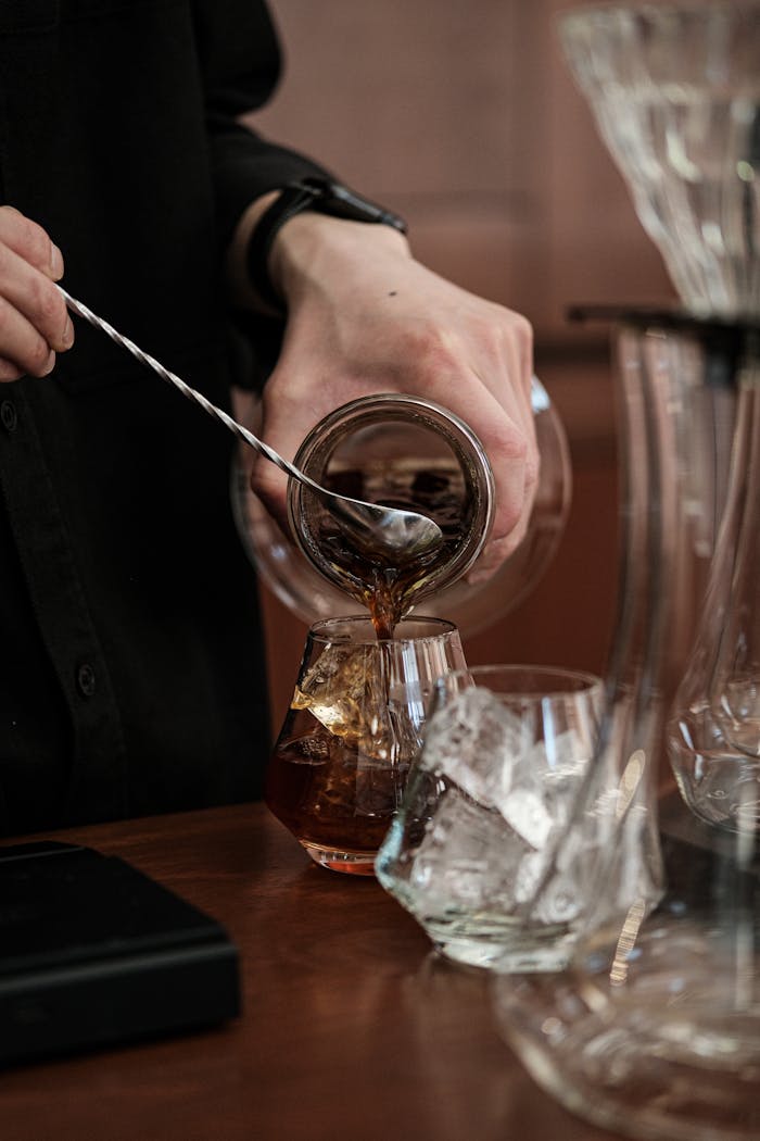 Close-up of a Man Making an Iced Coffee